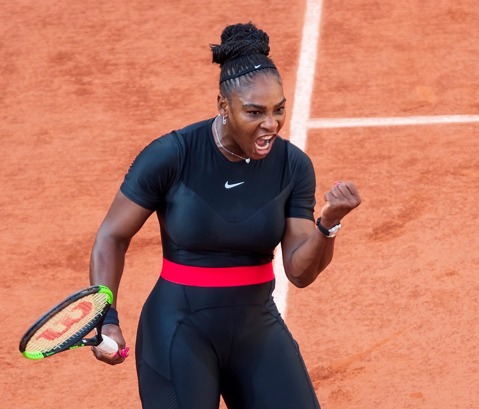 Serena Williams reacts  during her match against Julia Goerges.