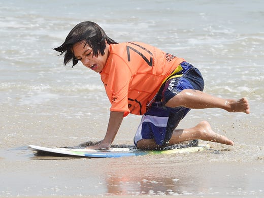 Mini Division competitor Andy Hahn does his best as Dewey Beach was the site of the Zap Amateur Skimboarding World Championships held on Saturday & Sunday August 9th and 10th with over 200 competitors from around the world competing in several divisions for the honors.
