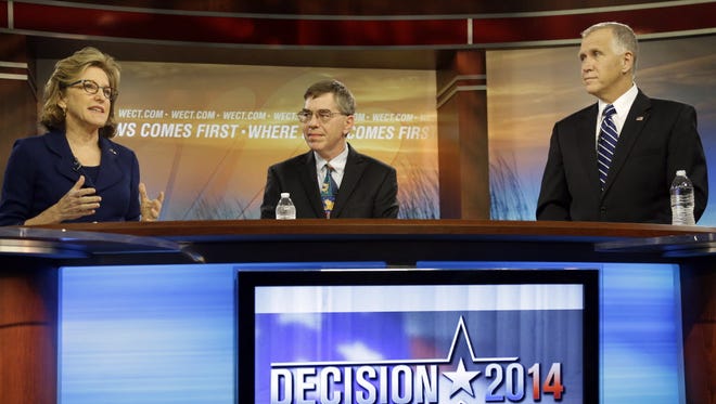 Sen. Kay Hagan, D-N.C., Libertarian Party Senate candidate Sean Haugh and Republican Senate candidate Thom Tillis during a live televised debate in Wilmington, N.C. on Oct. 9.