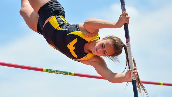 Callie Ruffener clears her height in pole vault during the Division II state final Friday at Jesse Owens Memorial Stadium in Columbus.