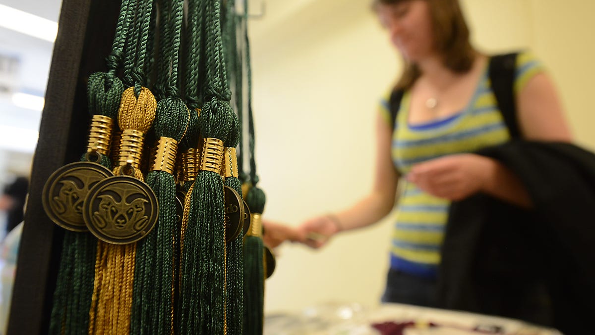 CSU graduates pick up their caps and gowns