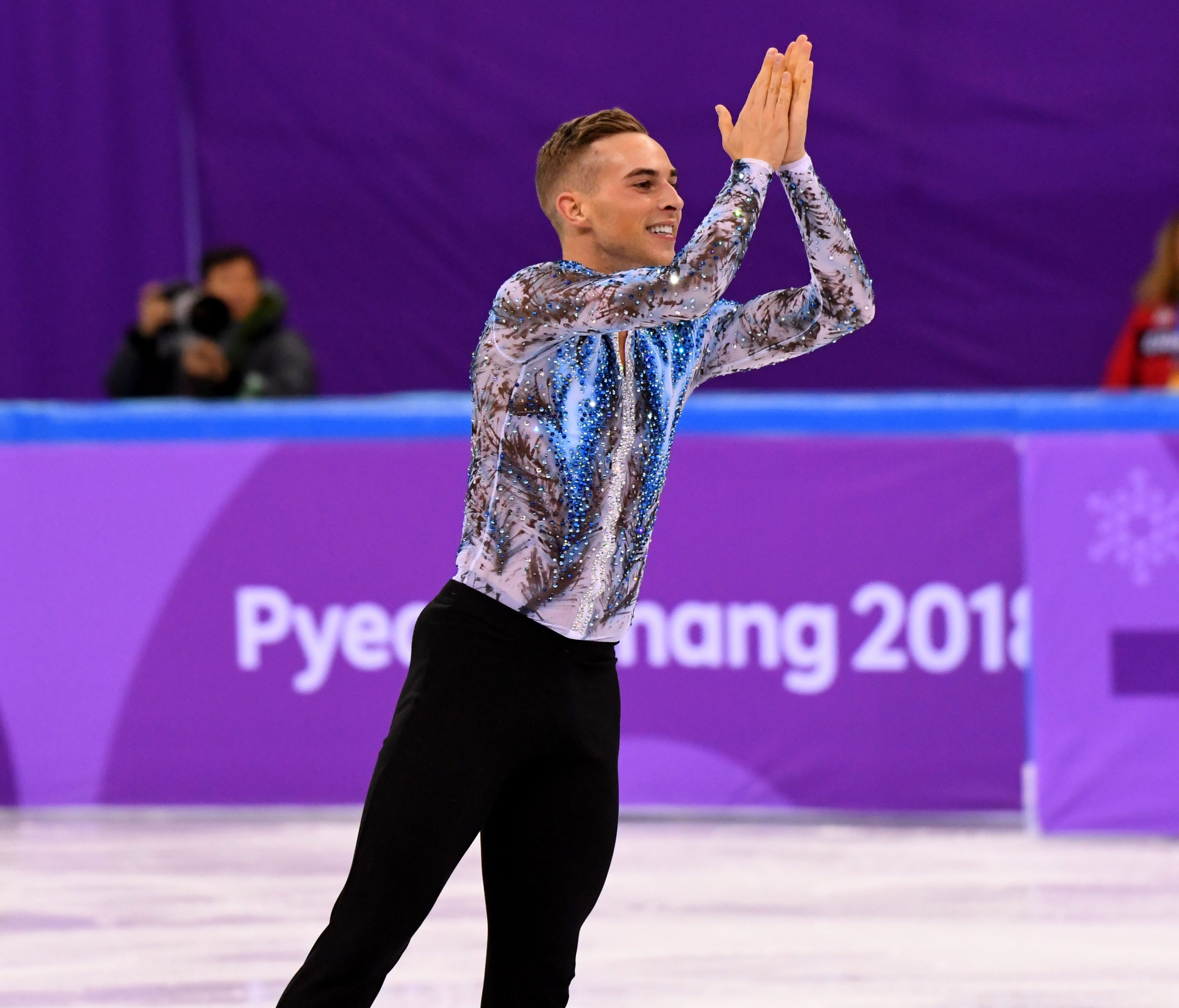 Adam Rippon (USA) performs in the team figure skating single free event.