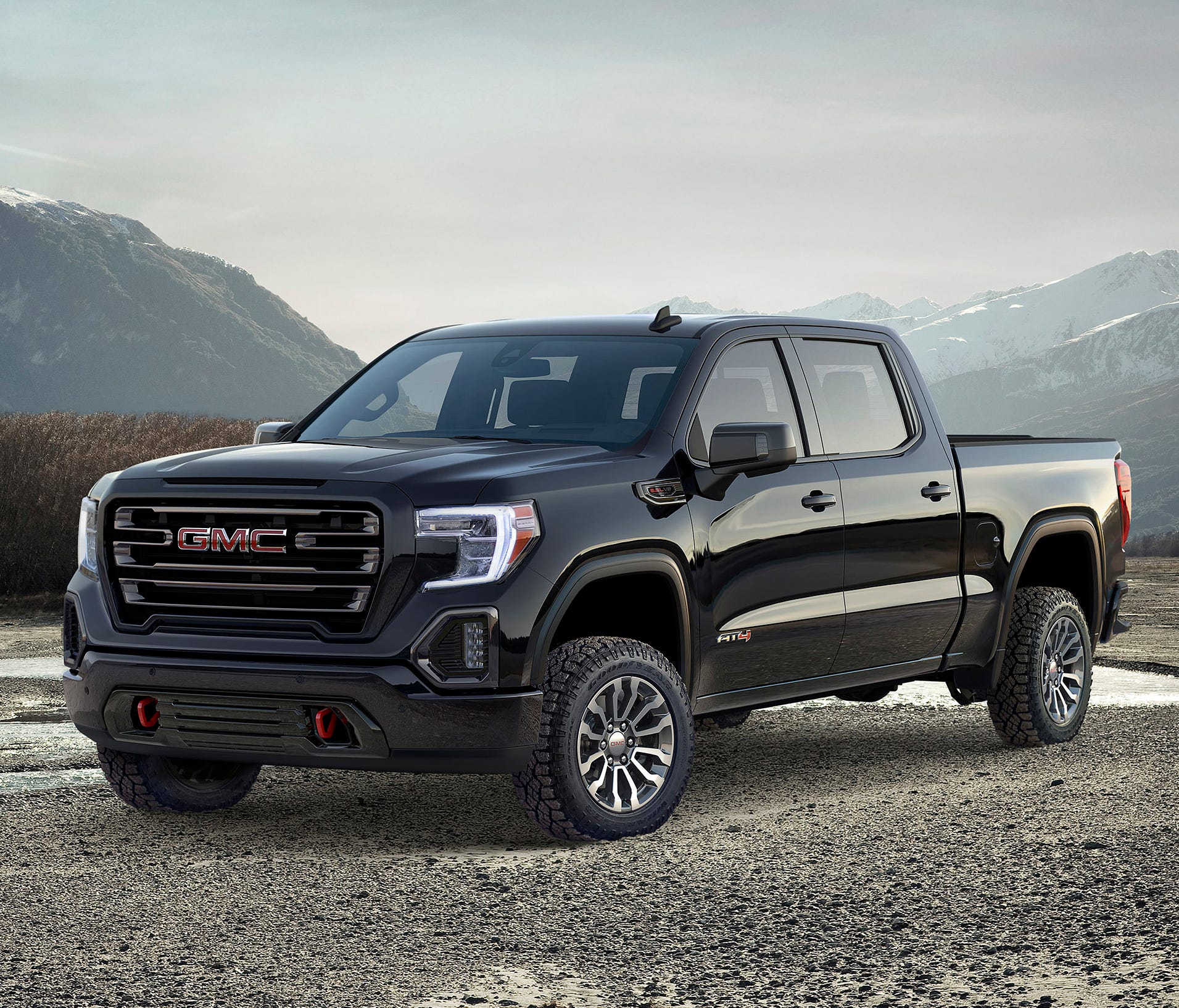 This undated photo provided by General Motors shows the 2019 GMC Sierra. The 2019 Sierra will offer a more upscale interior than the Chevy, along with other exclusive features such as a carbon-fiber cargo box and enhanced technology.