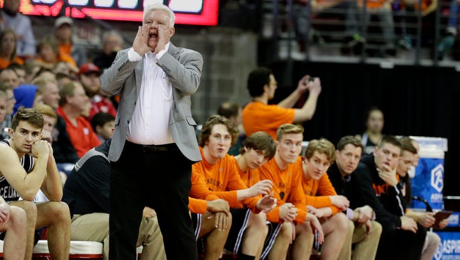 Cedarburg coach Tom Diener shouts in the first half of the Division 2 semifinal against  Milwaukee Washington.