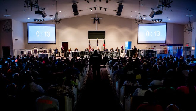 Mayoral candidates sit on stage during the Complexities of Color Coalition's Wilmington Mayoral Debate at the Ezion Fair Baptist Church in Wilmington on Monday evening.
