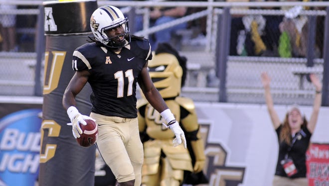 UCF wide receiver Breshad Perriman celebrates after a 50-yard touchdown catch against the Temple Owls.