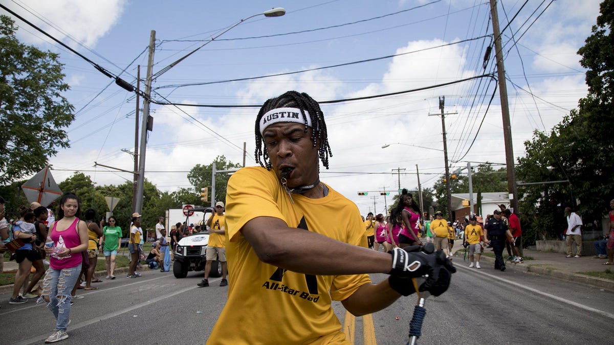 People line the streets to watch a Juneteenth parade on June 15, 2019, in Austin. Juneteenth commemorates the end of slavery in the United States.