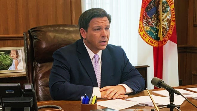 Florida Gov. Ron DeSantis updates media in the state's response to the coronavirus on March 24 in Tallahassee.
