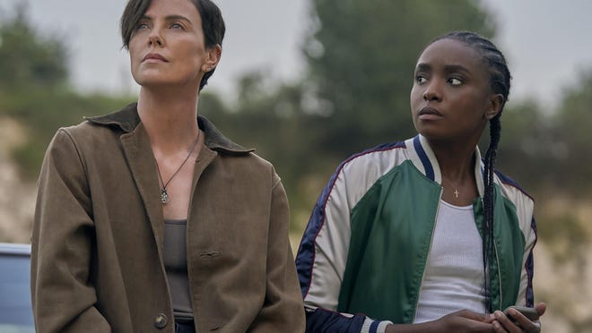 (L-R) Charlize Theron and Kiki Layne star in "The Old Guard."