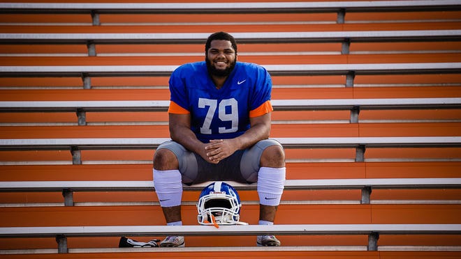 Savannah State University defensive lineman Kyle Frazier sits in the stands following practice at T.A. Wright Stadium. Frazier, who has overcome Hodgkins lymphoma, will be featured during the Monday Night football game featuring his favorite team, the L.A. Rams, on Oct. 26.
