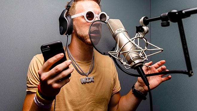 In this undated photo, hip-hop artist Wix Patton is shown recording vocals in a studio.