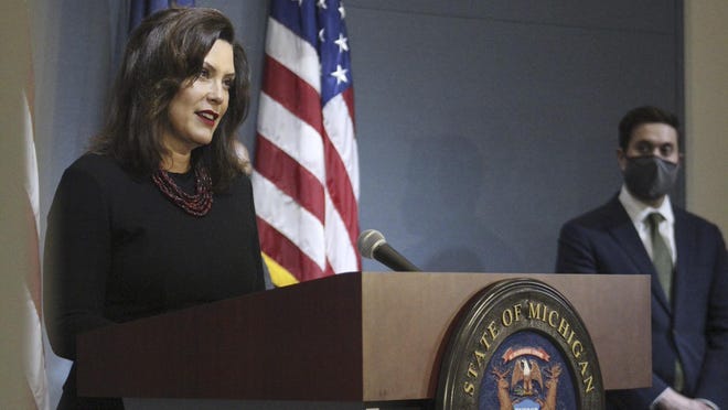In this photo provided by the Michigan Executive Office of the Governor, Gov. Gretchen Whitmer speaks during a news conference Friday, May 29, in Lansing. Whitmer named over a dozen appointments to state boards Friday, Oct. 16.