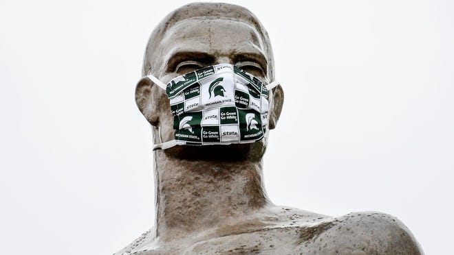 Sparty wears a Spartans mask on Wednesday, April 22, 2020, on the Michigan State University campus in East Lansing.