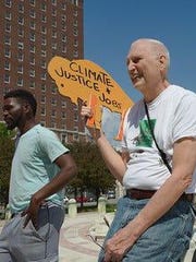 Martin Gugino shown in June 2019 at at Buffalo Youth Climate Strike rally.