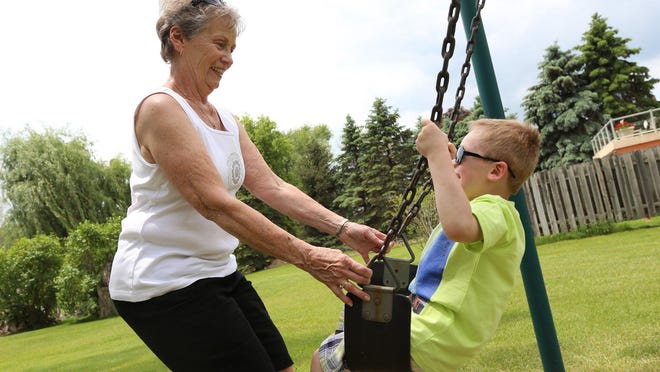 Joyce Esper, 76, of Highland has a life filled with activity and family, including great-grandson Bryson Crammer, 4. She worried forgetfulness was something more. Participating in the study trial, she says, can help people feel less helpless about the possibility of Alzheimer’s disease.