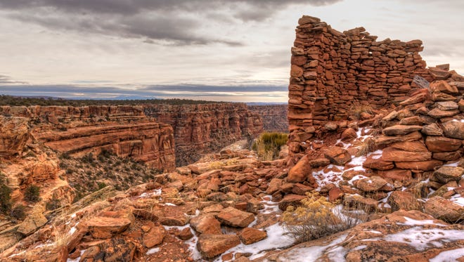 Snow-covered remnants of an Anasazi tower ruin on the rim of Mule Canyon in the Cedar Mesa area of Bears Ears National Monument.