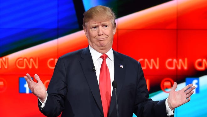 Donald Trump mocks a rival during the Dec. 15 Republican presidential debate.