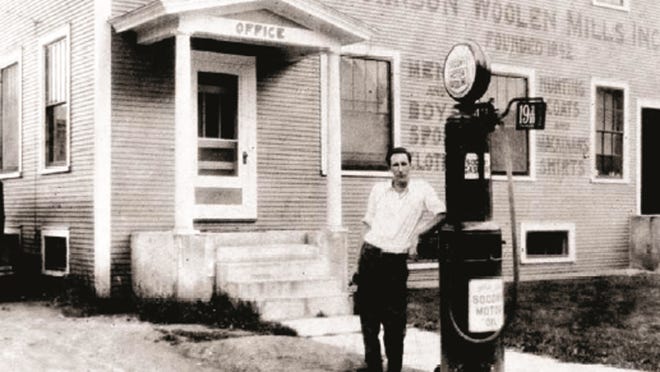 Robert Barrows stands in front of the old mill in Johnson (now the factory store) sometime around 1930.