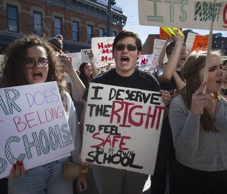 Greenville school district officials are discouraging students and teachers from participating in Wednesday's National School Walkout. Pictured are Colorado students participating in a recent walkout to protest gun violence in schools.