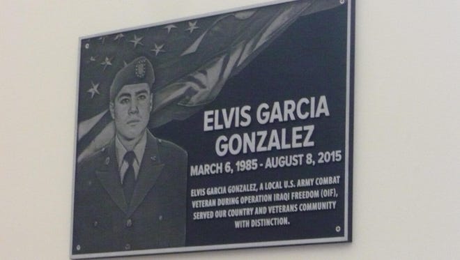 A plaque honoring fallen soldier Elvis Garcia Gonzalez at the Tulare Public Library.