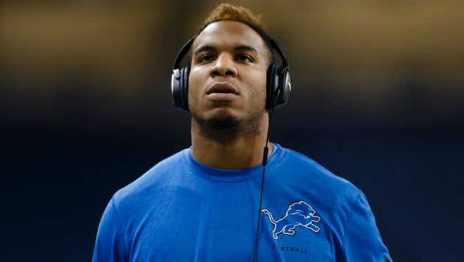 Detroit Lions tight end Eric Ebron warms up before a game against the Minnesota Vikings at Ford Field in Detroit on Dec. 14, 2014.