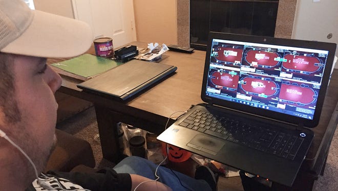 Former Dumont resident James Piccolo playing online poker at home in Las Vegas.