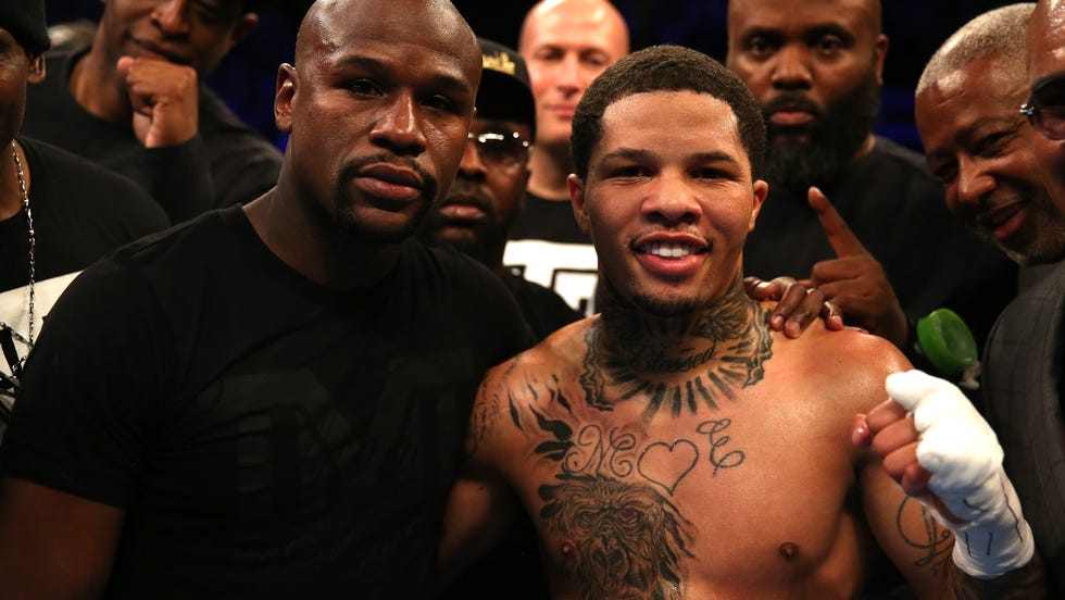 Gervonta Davis (right) has business role model in his promoter, Floyd Mayweather. Alex Pantling / Getty Images