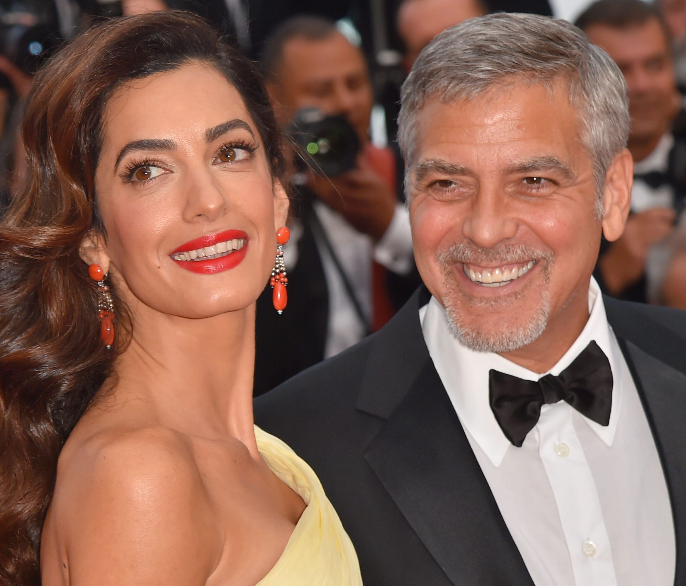 Actor George Clooney, left, and his wife Amal Clooney at the 69th Cannes Film Festival in Cannes, France.