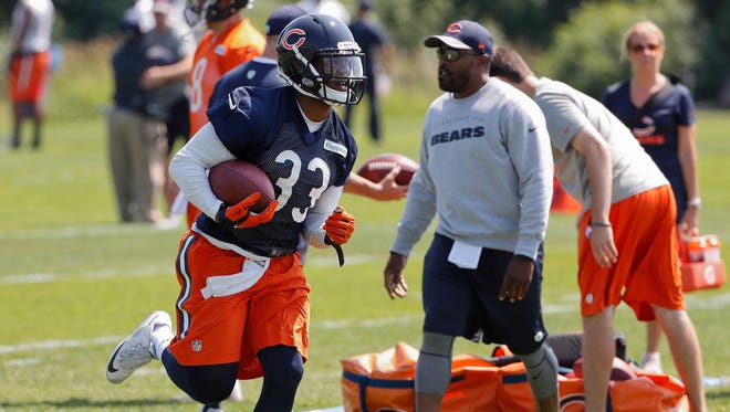 Chicago running back Jeremy Langford (33) runs with the ball during the Bears' mini-camp on June 14 in Lake Forest, Illinois.