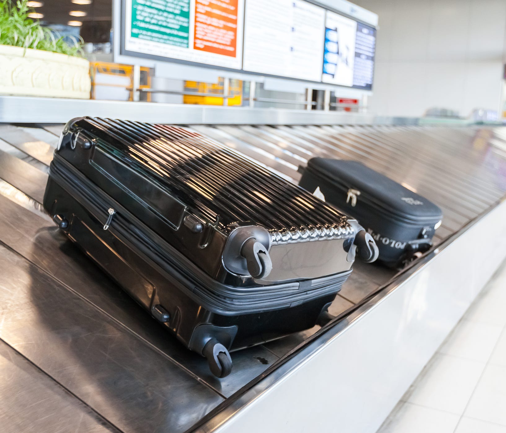 A four-wheeled rolling suitcase is less likely to get tossed around by airline baggage handlers.