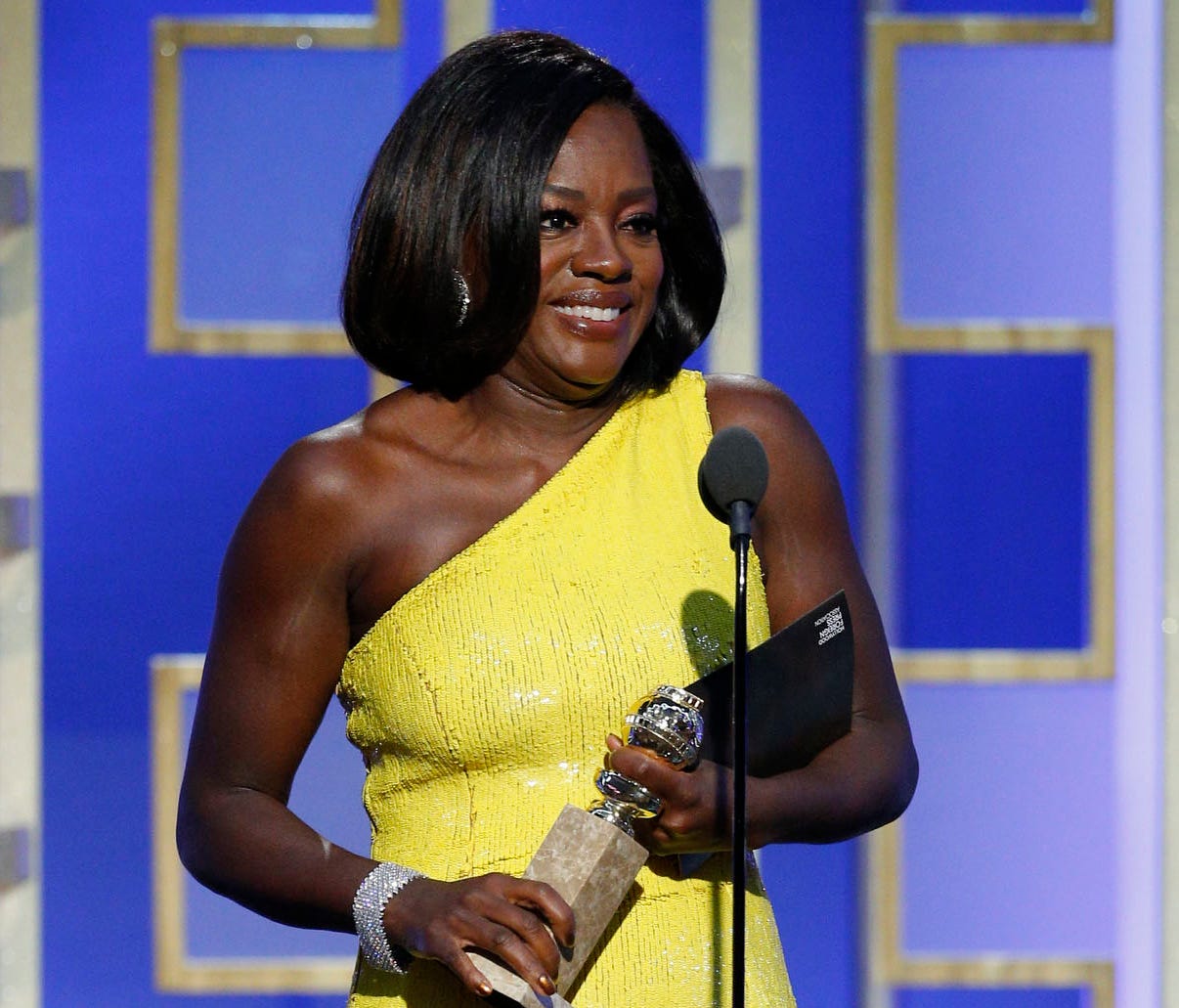 Viola Davis accepts her award for best supporting actress in a movie for 'Fences.'
