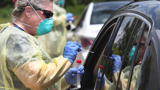 Drive-thru testing continued Thursday at Chisholm Elementary School in New Smyrna Beach. Also on Thursday, the state announced a record-high number of 3,207 new coronavirus cases, with Volusia County reporting its highest number of new cases at 62.