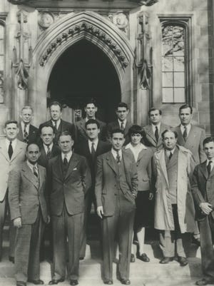 Many of the scientific pioneers who launched the nuclear age stand in front of Eckhart Hall at the University of Chicago on Dec. 2, 1946, the four-year anniversary of the world's first self-sustaining, controlled nuclear chain reaction. Front row (left to right): Enrico Fermi, Walter H. Zinn, Albert Wattenberg, and Herbert L Anderson. Middle row: Harold Agnew, William Sturm, Harold Lichtenberger, Leona Woods Marshall, and Leo Szilard. Back row: Norman Hilberry, Samuel Allison, Thomas Brill, Robert G Nobles, Warren Nyer, and Marvin Wilkening.