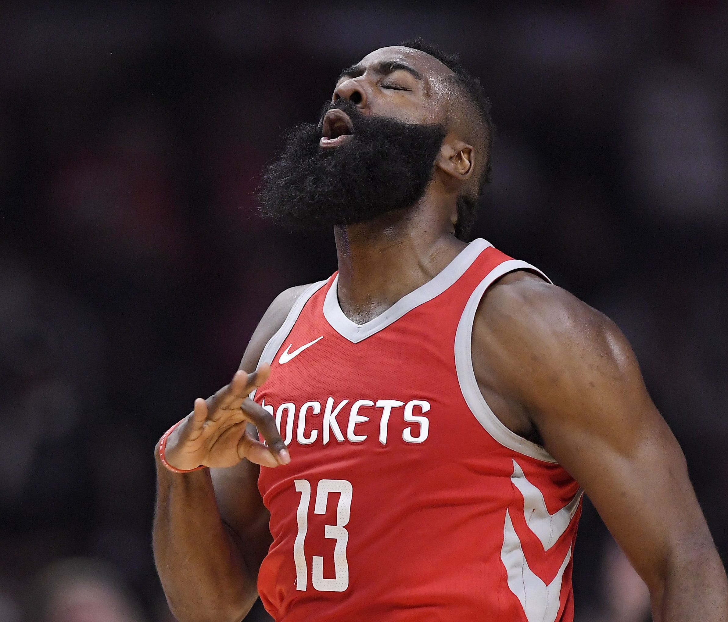James Harden celebrates after hitting a 3-point shot during the first half against the Clippers.