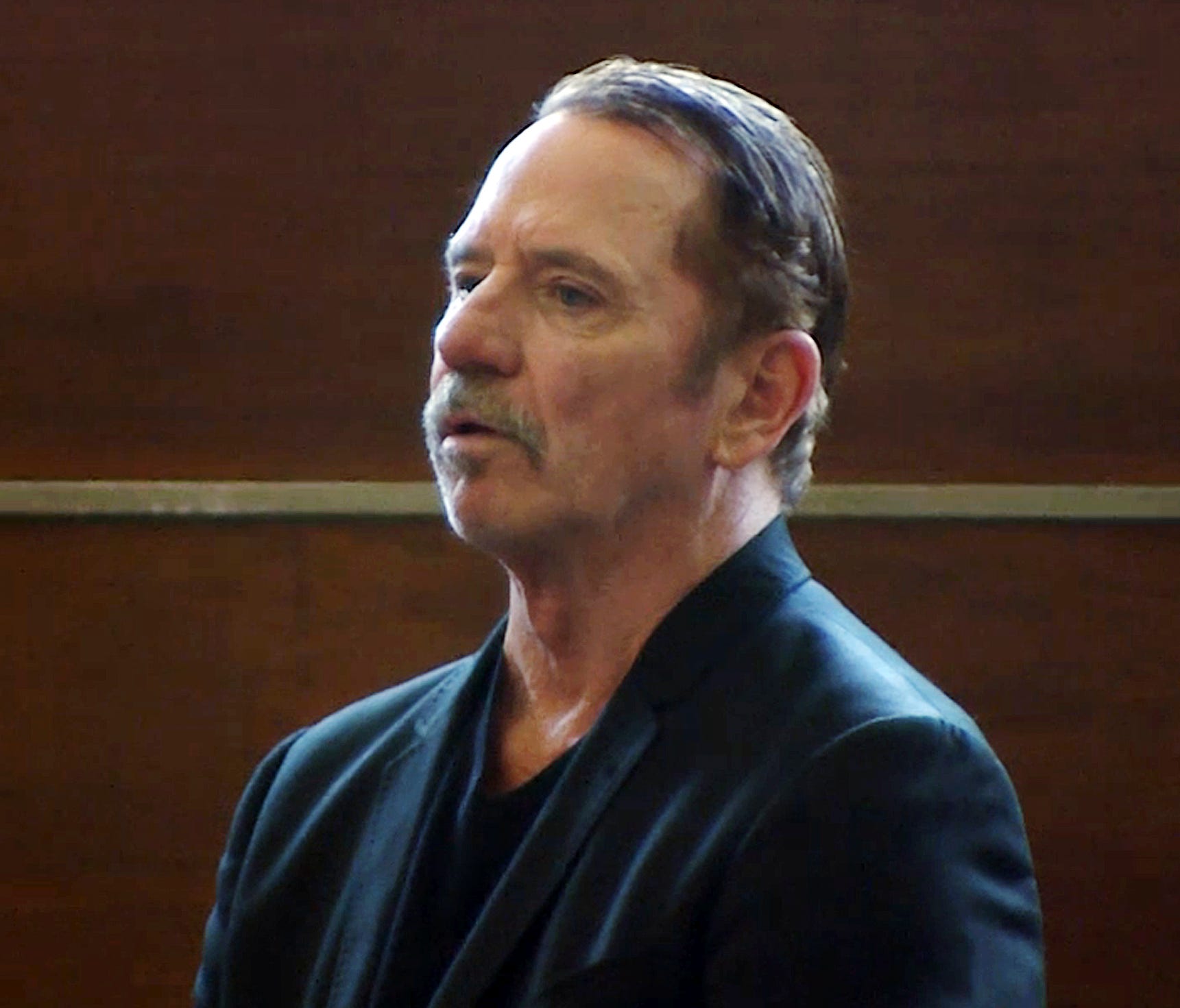 Tom Wopat at his arraignment on Aug. 3 in Waltham, Mass., on indecent assault and battery and drug possession charges, in image taken from video.