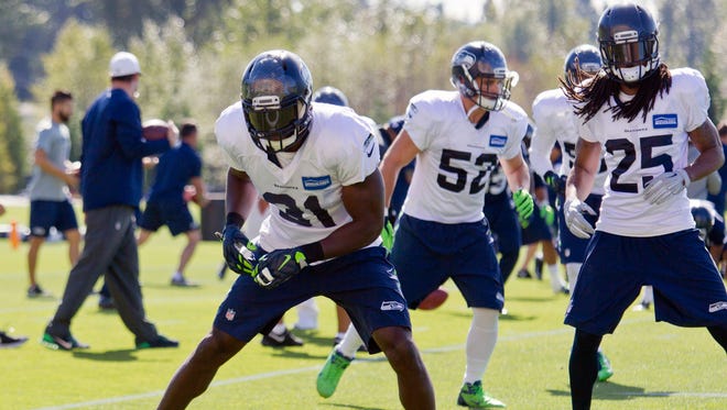 Seattle Seahawks' Kam Chancellor (31) attends NFL football practice for the first time after holding out over a contract dispute, on Wednesday, Sept. 23, 2015. at the team headquarters in Renton, Wash.