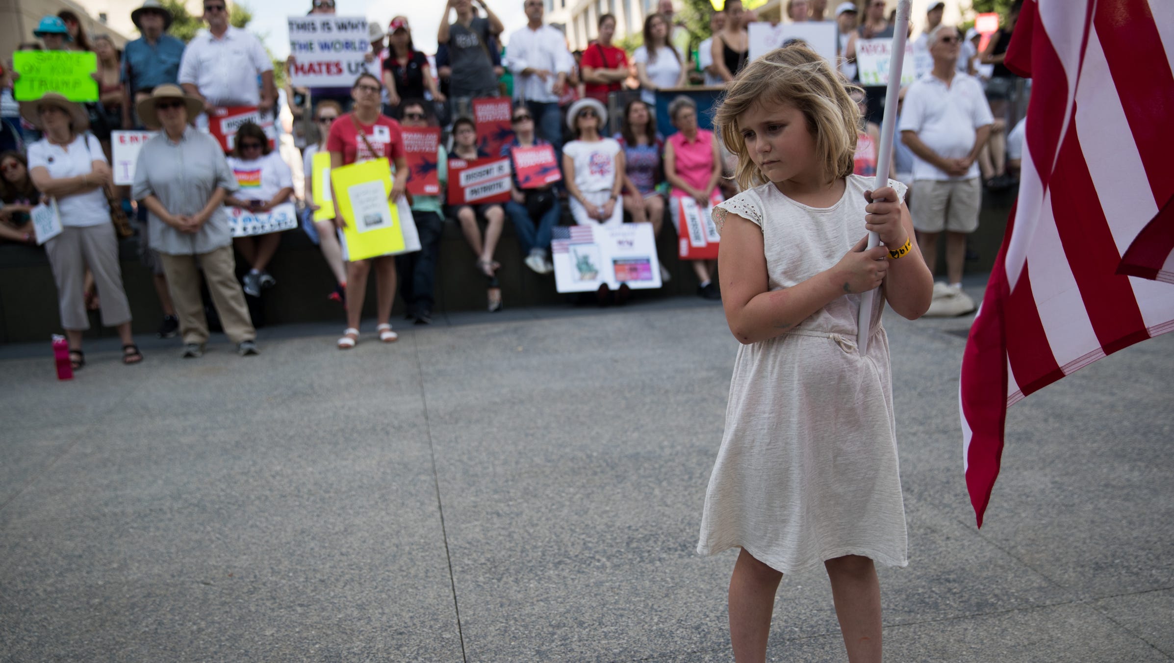 Josephine Shaver, 8, Indianapolis, holds an American