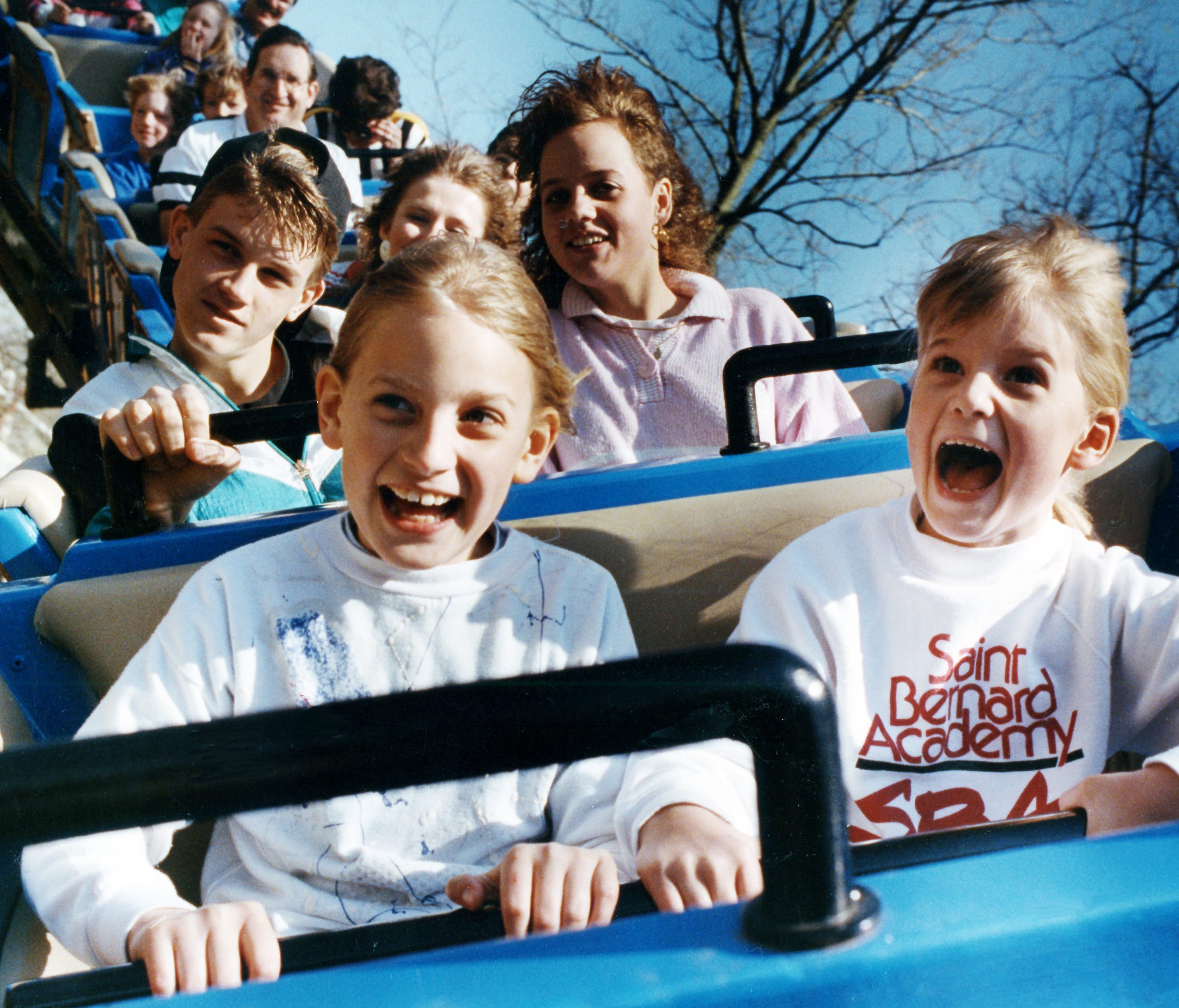 Jessica Logan, left, 10, and Kathryn Logan, 6, both of Nashville, scream with delight on the Rocking Roller Coaster at Opryland theme park. The park opened for it 20th anniversary season March 31, 1991.