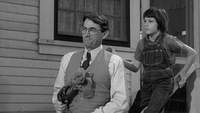 Gregory Peck plays Atticus Finch, a Southern lawyer devoted to justice and his kids in "To Kill a Mockingbird."