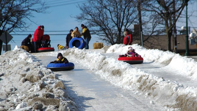 Tube sledding on new and improved runs is among the activities visitors can enjoy at the 2015 edition of downtown Rochester’s Fire & Ice Festival.