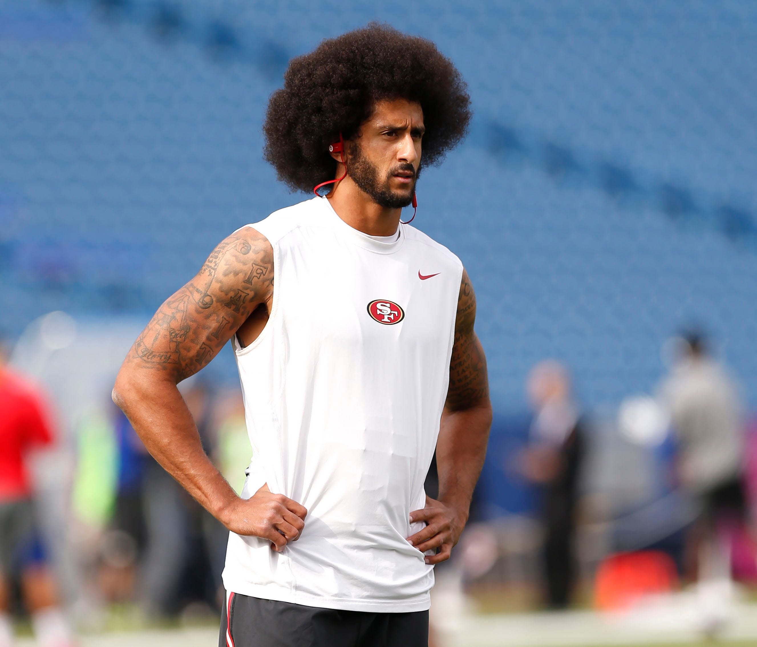 San Francisco 49ers quarterback Colin Kaepernick (7) on the field before the game against the Buffalo Bills at New Era Field.