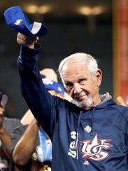 United States manager Jim Leyland tips his cap to the