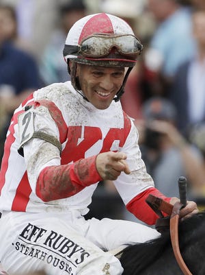 Jockey Javier Castellano celebrates aboard Cloud Computing after winning the 142nd Preakness Stakes horse race at Pimlico race course, Saturday, May 20, 2017, in Baltimore. (AP Photo/Matt Slocum)