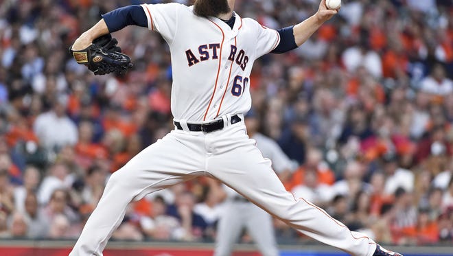 Houston Astros starting pitcher Dallas Keuchel delivers in the second inning of a baseball game against the Seattle Mariners, Monday, April 3, 2017, in Houston. (AP Photo/Eric Christian Smith)