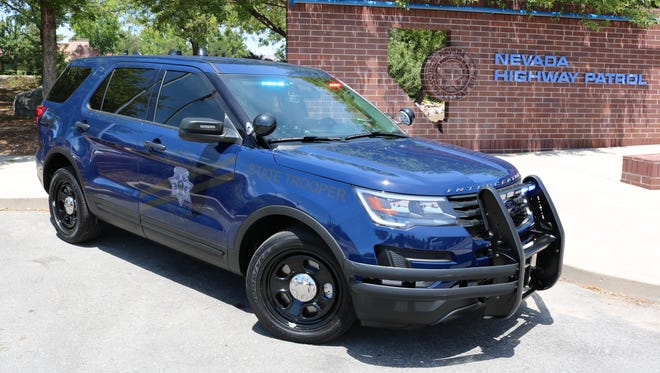 A side view of a Nevada Highway Patrol vehicle outfitted in the new "ghost" markings, which are more difficult to identify.