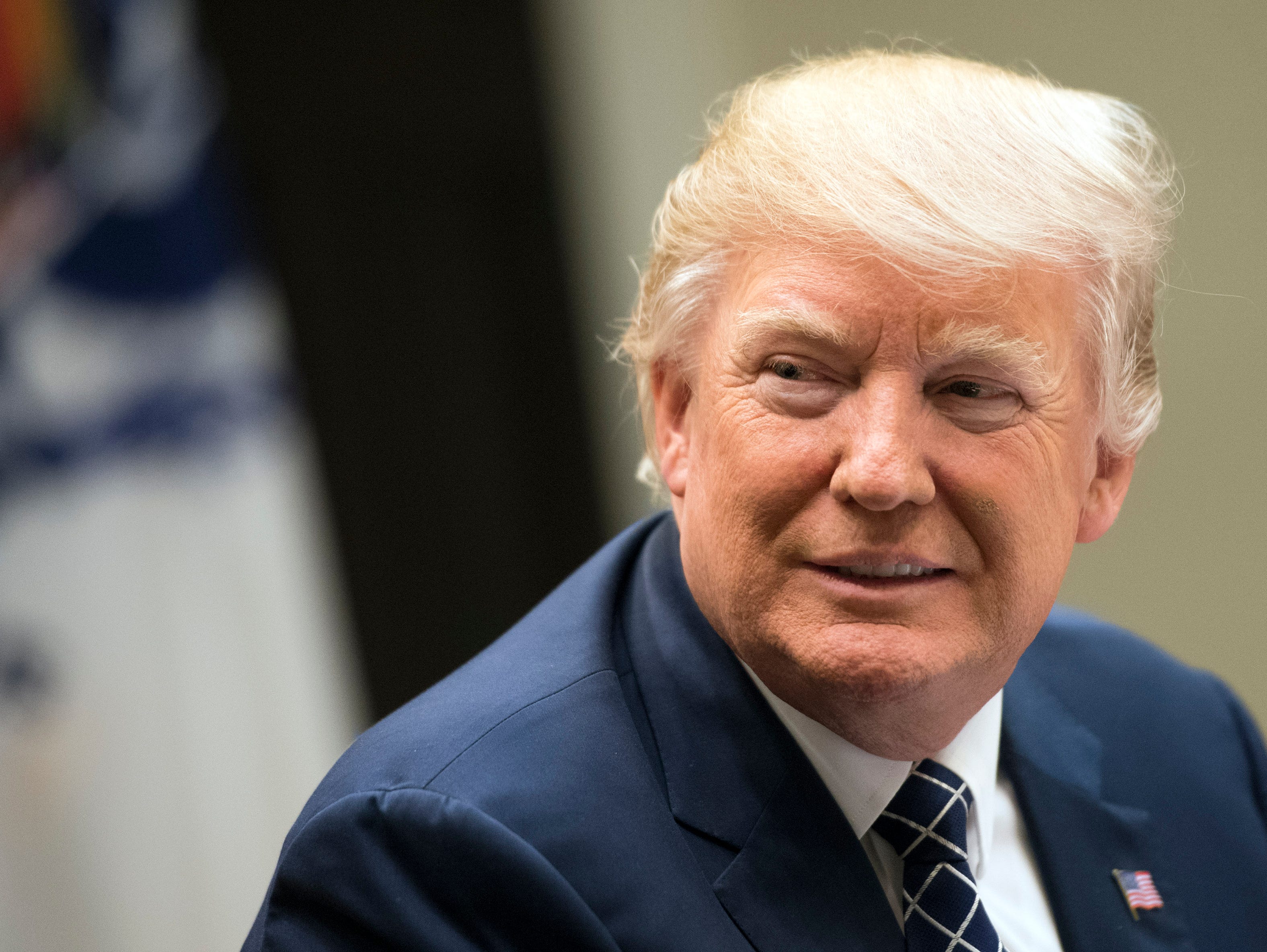 WASHINGTON, DC - MARCH 09:  US President Donald Trump holds a National Economic Council listening session with the CEOs of small and community banks, in the Roosevelt Room at the White House on March 9, 2017 in Washington, D.C. (Photo by Kevin Dietsc