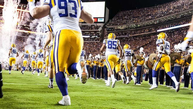 LSU Tigers taking the field as they take on  the Alabama Crimson Tide in Baton Rouge on Saturday night in Death Valley, November 5, 2016. BUDDY DELAHOUSSAYE/ THE ADVERTISER