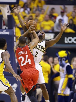 No foul was called as Indiana Pacers guard Rodney Stuckey (2) makes contact with Toronto Raptors guard Norman Powell (24) as he drives the ball to the basket during the first half of game 6 in an NBA basketball playoff game, Friday, April 29, 2016, at Bankers Life Fieldhouse.