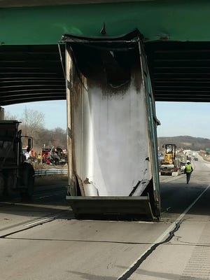 A dump truck that was traveling northbound on I-43 with its box up struck the Racine Ave. overpass in New Berlin about 1 p.m. on Friday. The driver was injured.