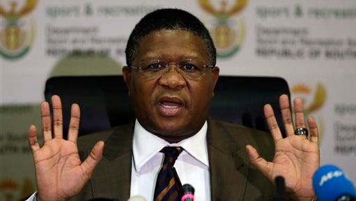 South Africa's sports minister Fikile Mbalula gestures as he speaks during a news conference in Johannesburg, South Africa, Wednesday, June 3, 2015.  Mbalula "categorically" denied on Wednesday that the $10 million paid to former FIFA official Jack Warner in 2008 was a bribe for his help in securing the World Cup. (AP Photo/Themba Hadebe)